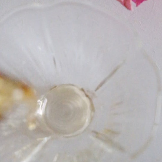 lmtea honey black tea being poured into a floral cup